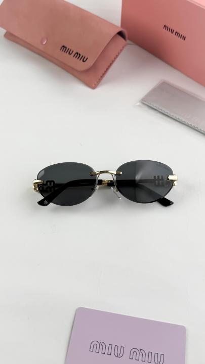 MIU MIU GLASSES